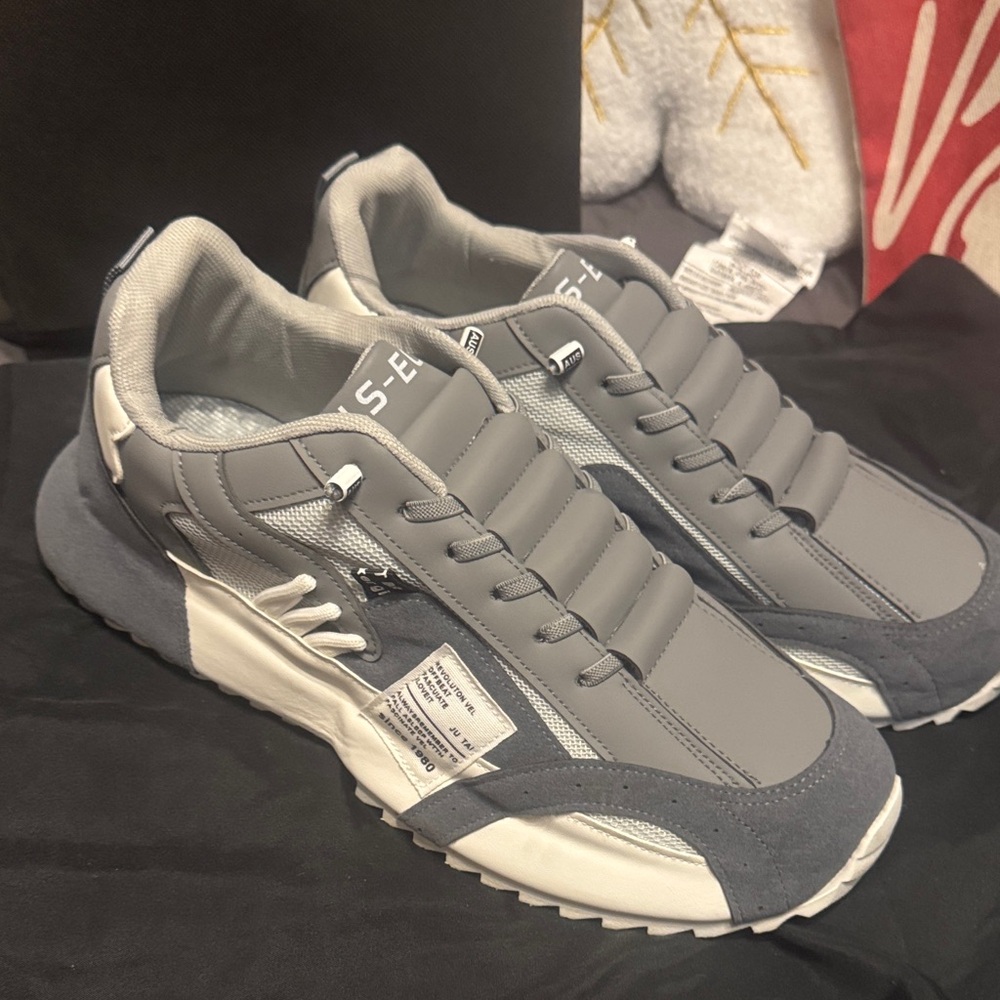 Revolution Gray and White Sneakers